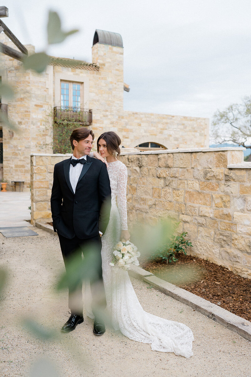 A bride and groom share a romantic moment on their wedding day in New Jersey.