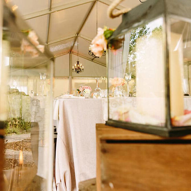 This elegant photograph captures the beautifully arranged reception details at Meadow Muse Pavilion, showcasing the venue's charm and attention to detail for a memorable celebration.