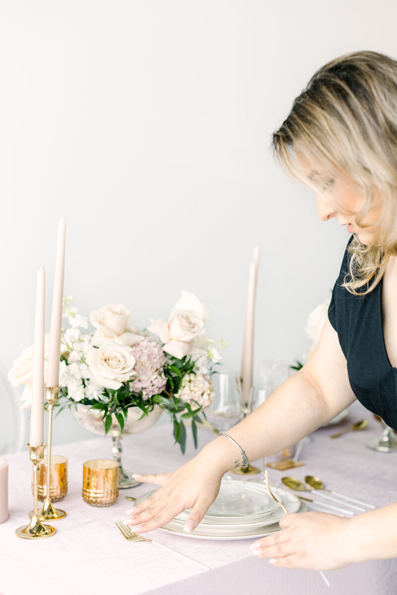 pink bridal shower arches decorated with white roses
