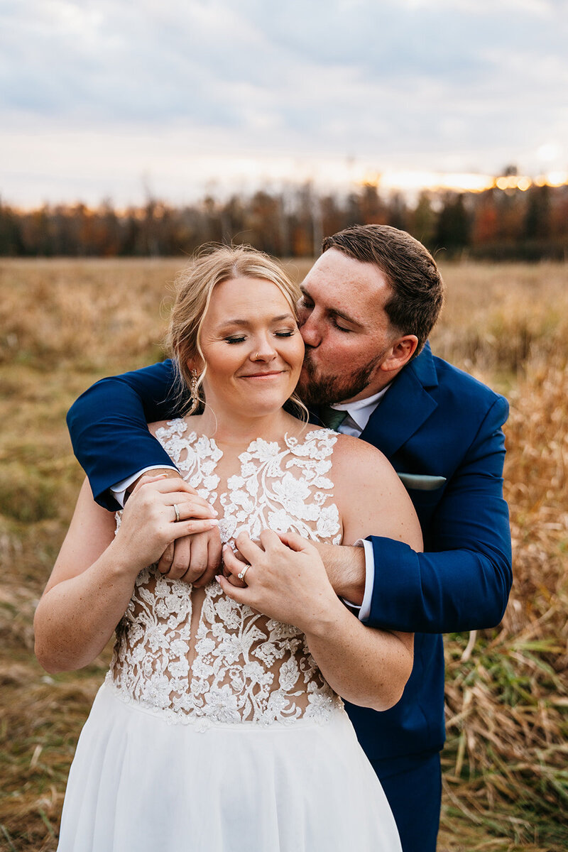 Photo of bride and groom close together, taken by Minnesota Wedding Photographer, Kelly Friday Photography.