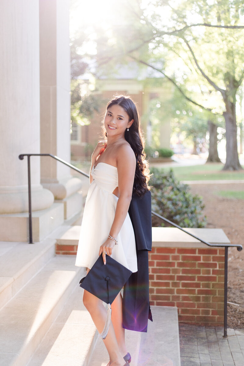 graduate-walking-up-steps-charlotte-nc
