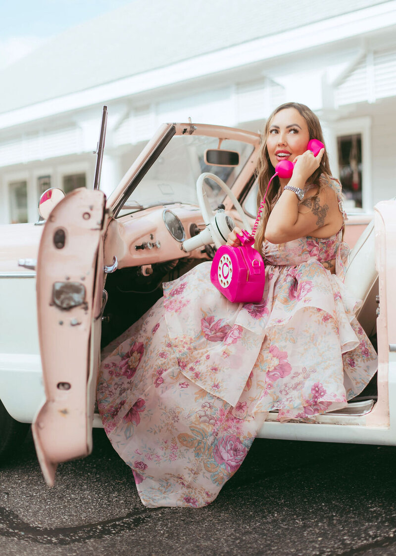 Iconic Lash founder and  Lash Artist Mentor Lea Love  poses near some water