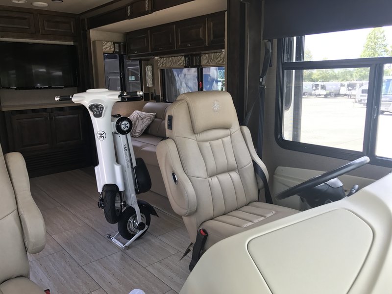 White Go-Bike M1 folded up inside RV