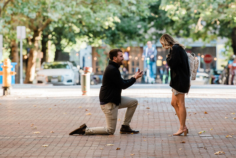 boyfriend proposes to girlfriend in downtown seattle