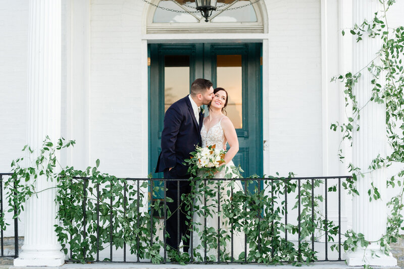 MD-wedding-florist-Ceresville-Mansion-winter-wedding-greenery-balcony-decor