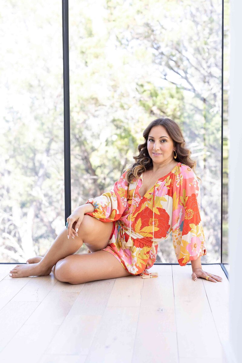 Visual brand identity photography of a beautiful female coach captured in an inspiring setting with an incredible view, featured in a professional branding gallery.