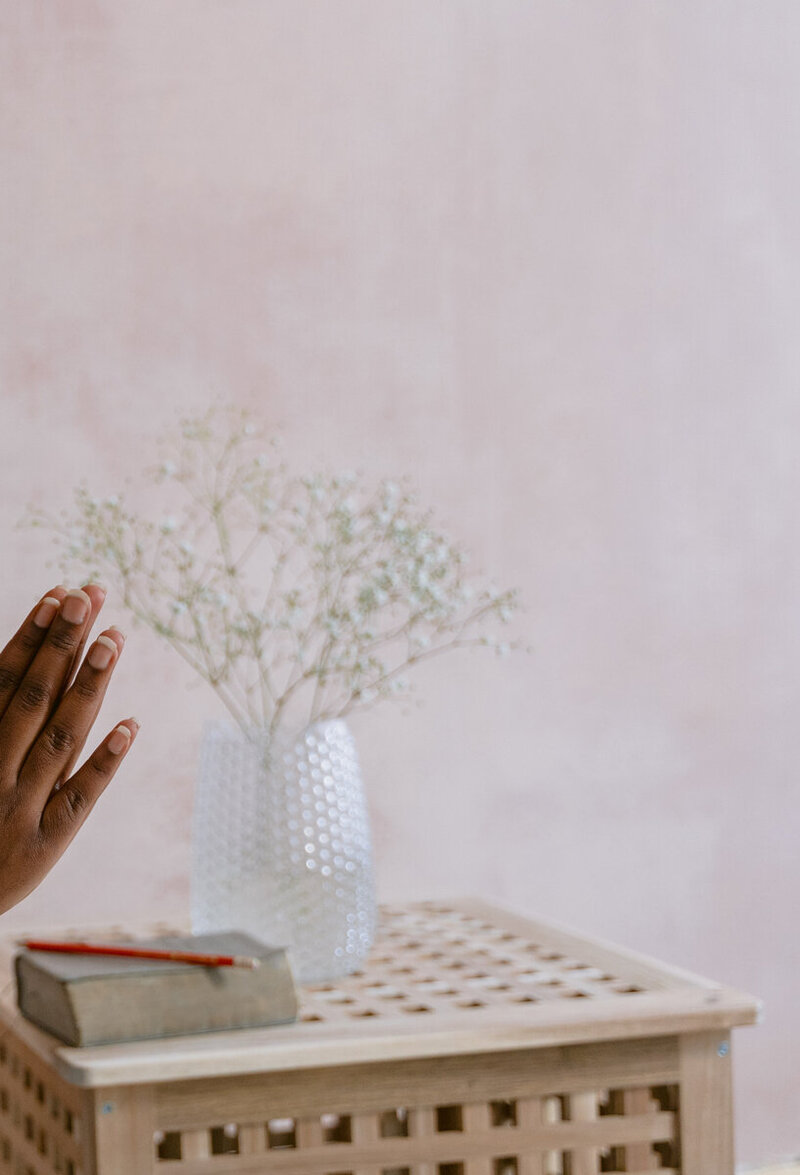 Hands clasped together in devotion