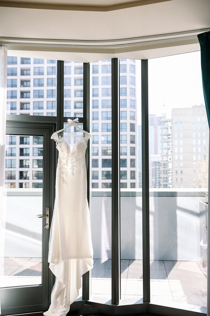 bride's dress in window