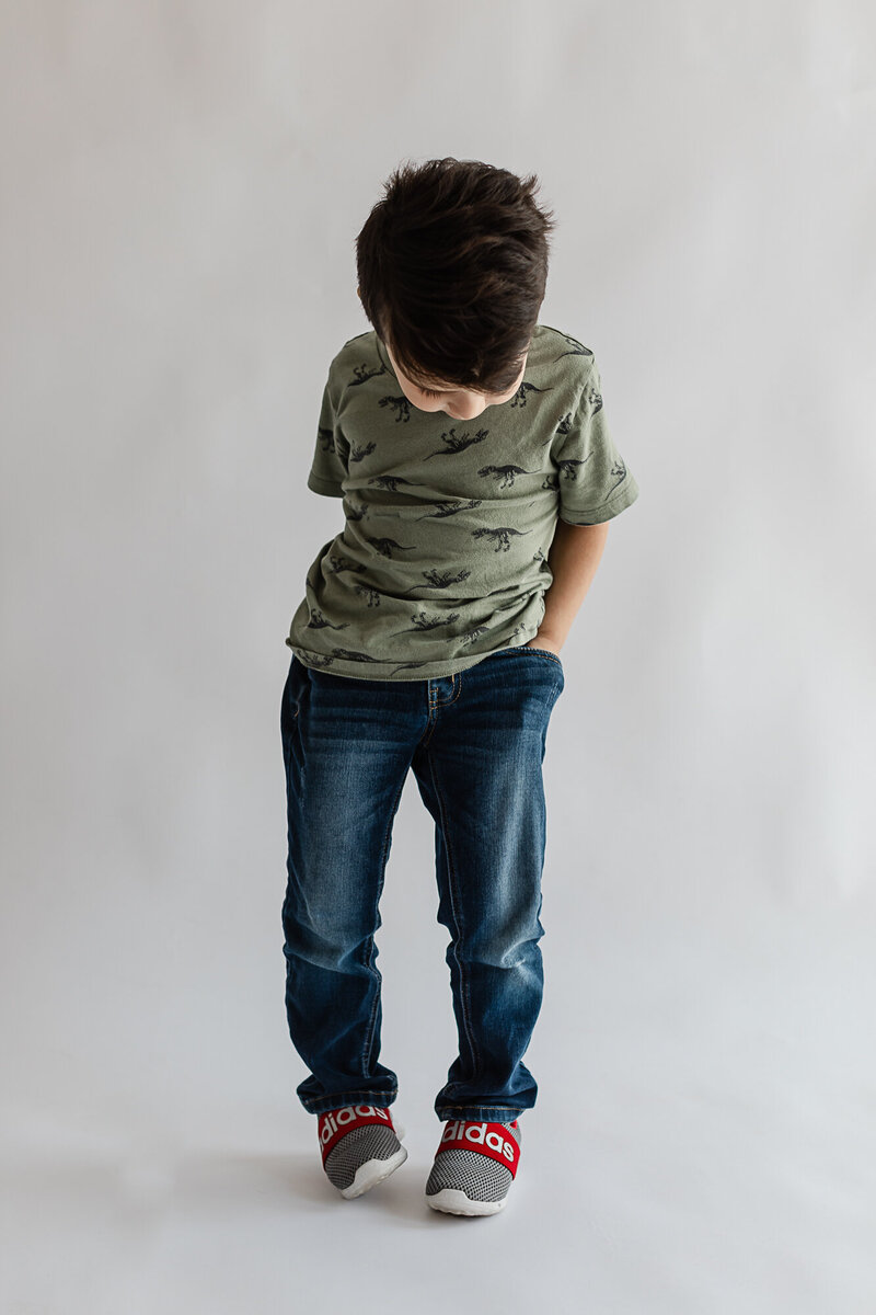 Little boy hands in his pockets color image