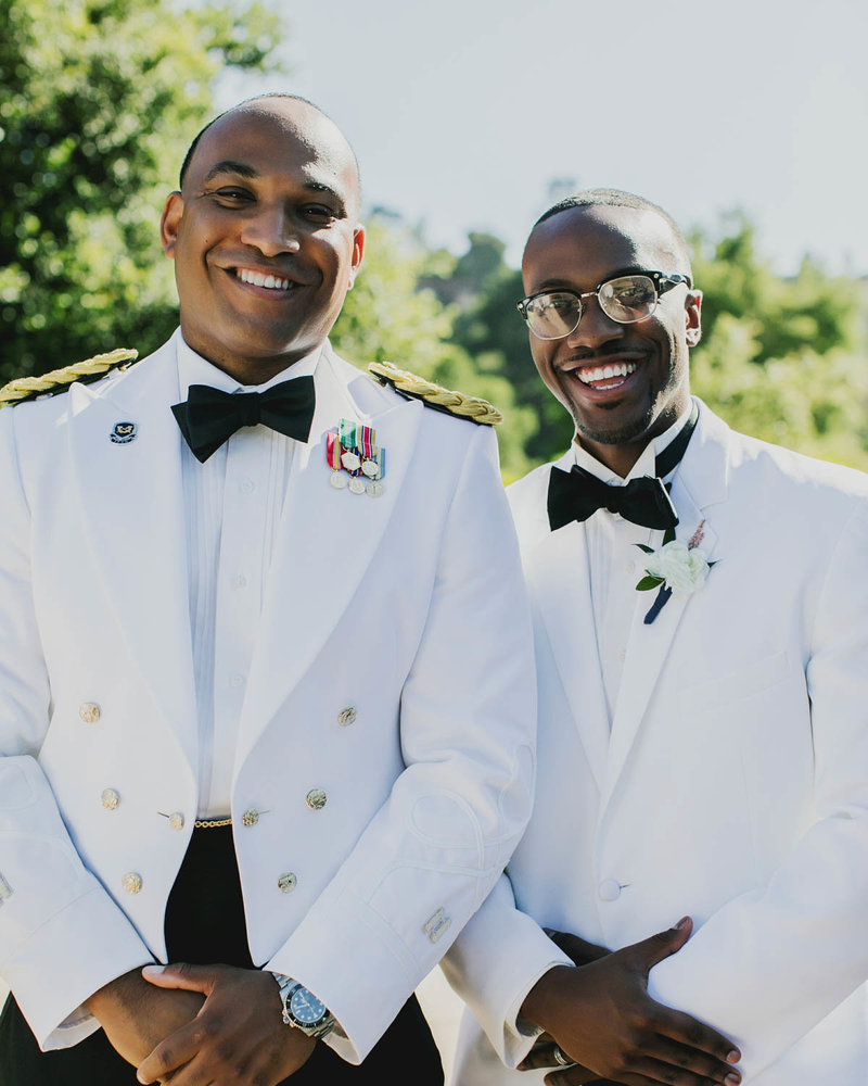 Groom + Groomsman Portrait smiling at the camera
