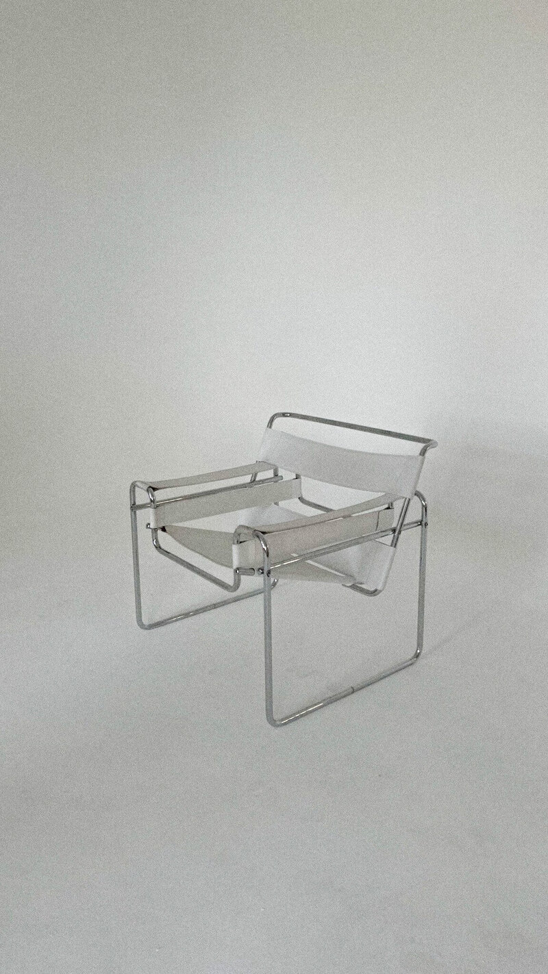 a white and silver chic modern chair