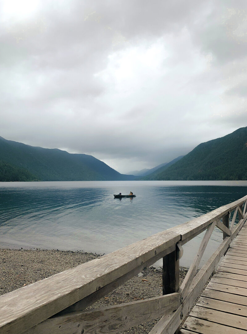 2 people in a boat on Lake Crescent in Olympic National Park