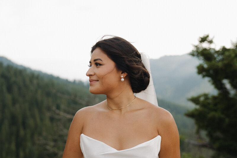 Wedding Bride looking at the groom in the mountains of Montana