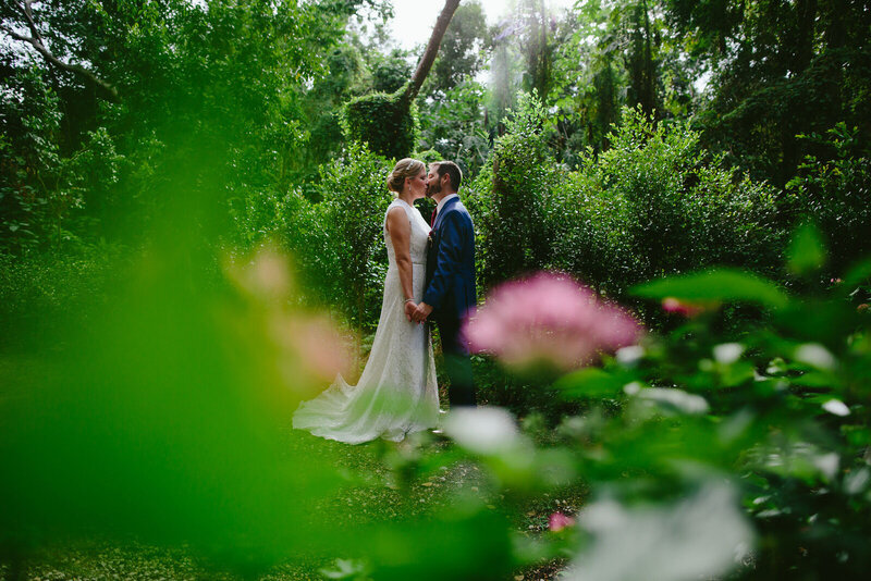 Bride-and-groom-Kissing-Gardens-Deering-Estate-Wedding