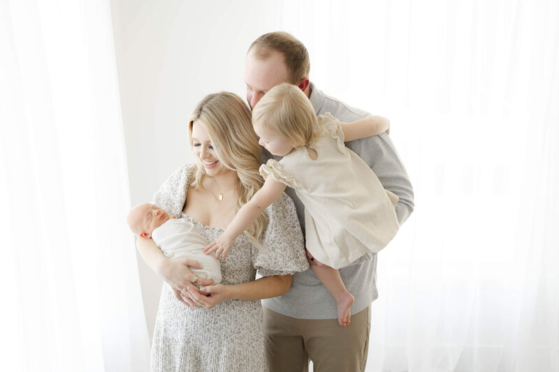 oklahoma city newborn and family in a natural light studio