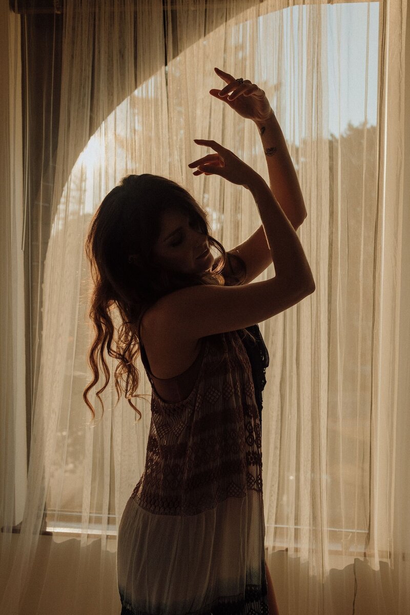 Luna Skye dancing in shadow