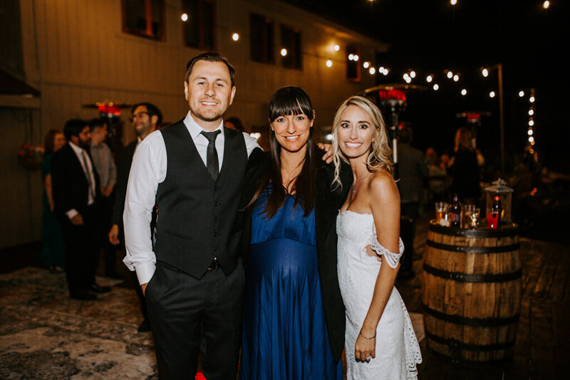 Bride and groom with coordinator at Cienaga Creek Ranch