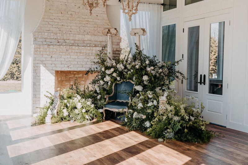 Wedding planner pops a bottle of champagne with her team