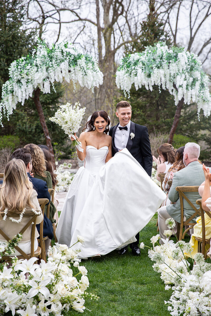 Bride and groom smiling at each other