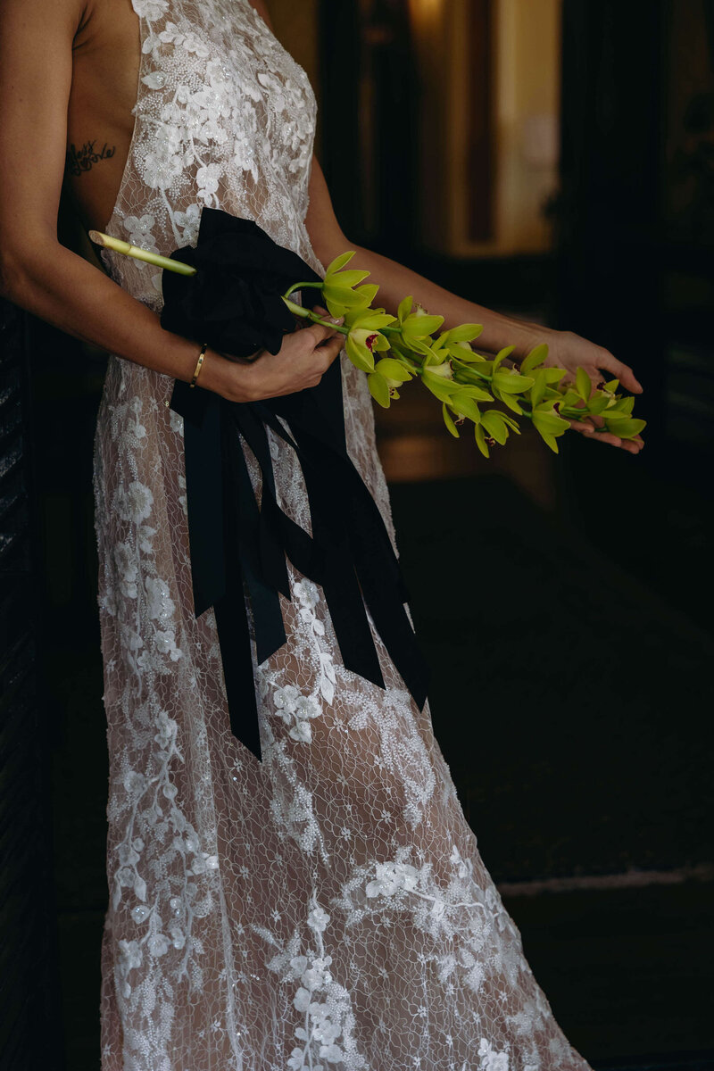 single-stem-of-cymbidium-orchid-black-velvet-ribbon