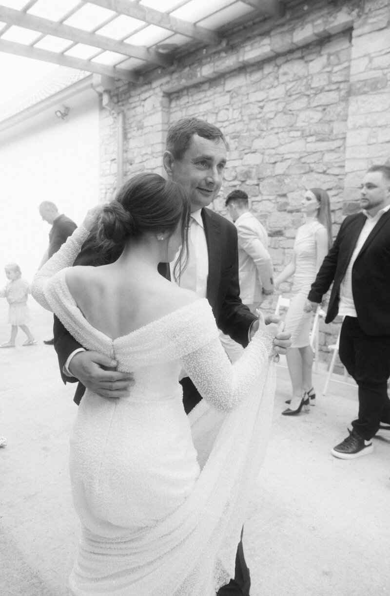 Luxury wedding in Europe – sophisticated bride in a modern wedding gown and groom in a timeless suit.