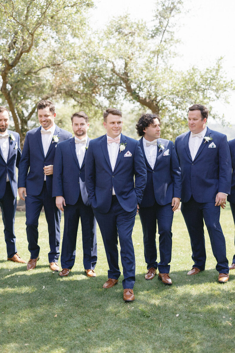 Wedding party photos beneath oak trees at Canyonwood Ridge