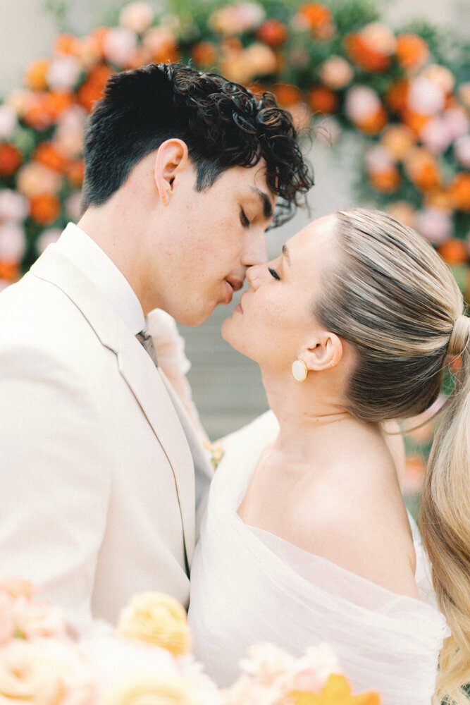 couple almost kissing