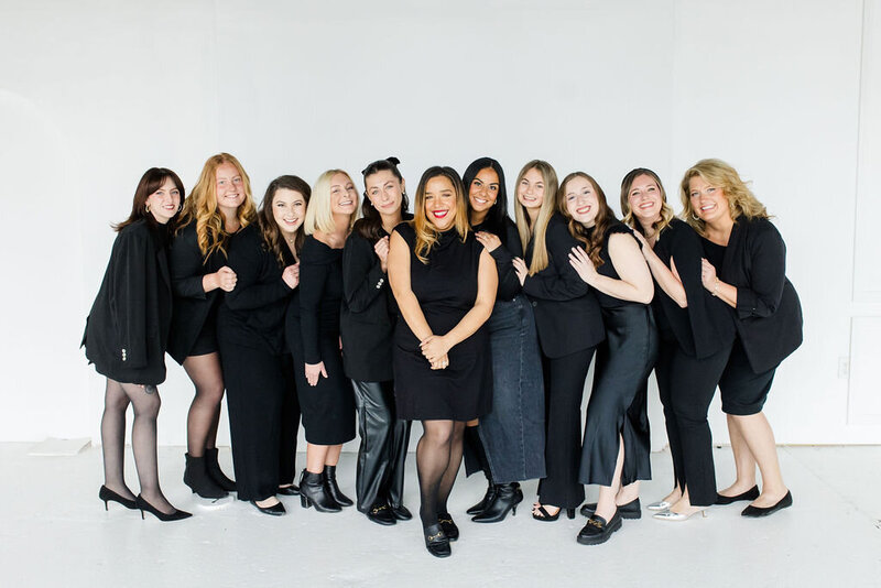 The Aisle & Co. team poses for a group photo in their headquarters