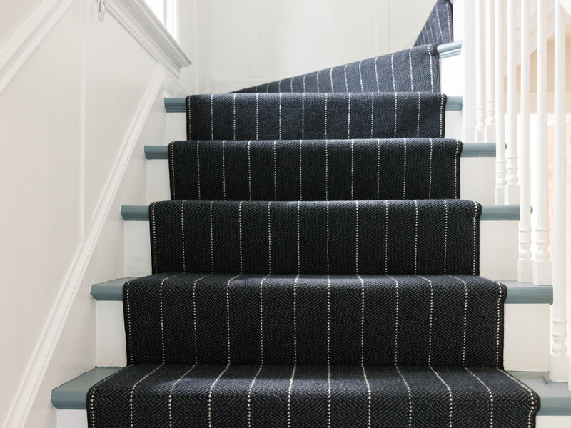 Navy blue stair runner by CG Coe and sons carpeting  in Old Town, Alexandria, VA.