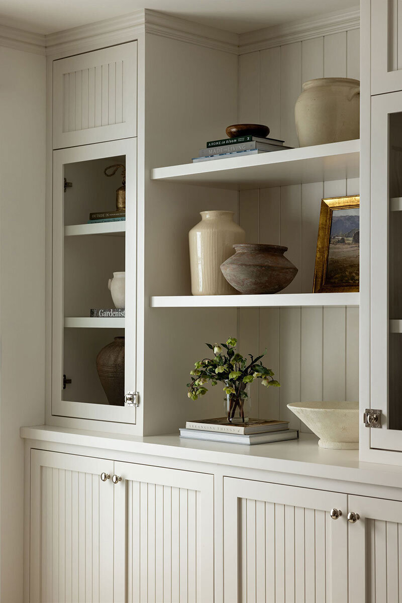 Built-in bookcase and reclaimed wood touches in a timeless California home