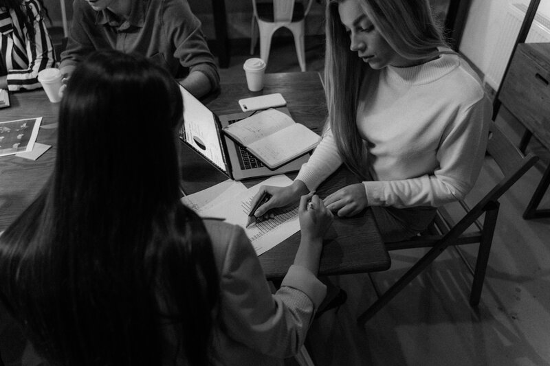 women gathered around a table