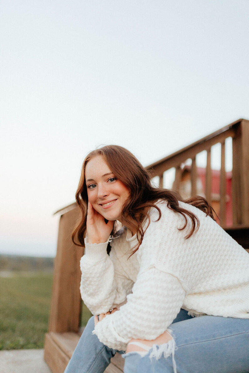 Girl leaning on elbows