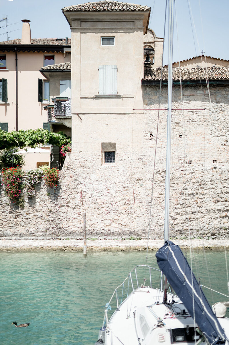 Sirmione walls sorunded by boats