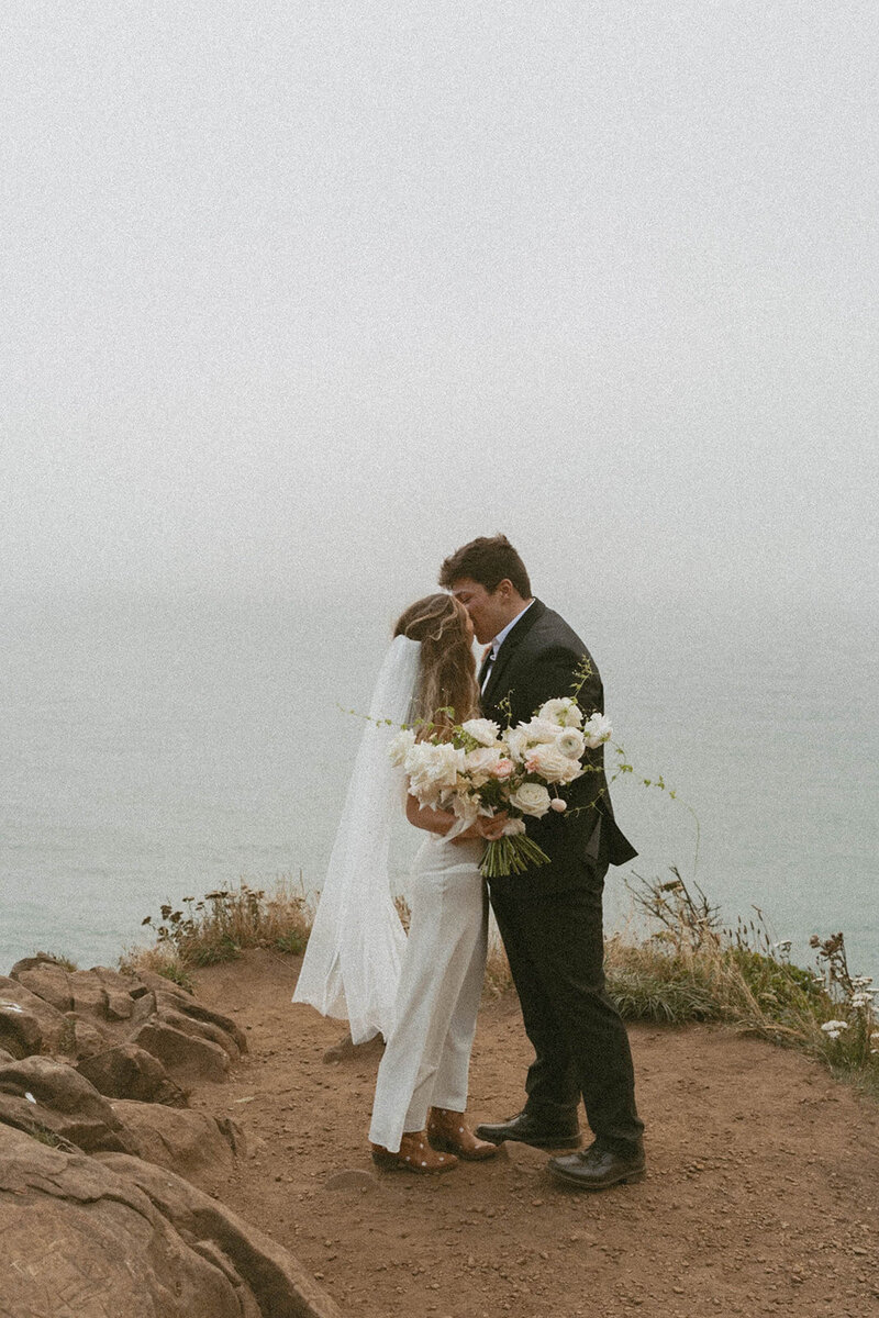 Kourtney and Sage dancing in forest on their elopement day