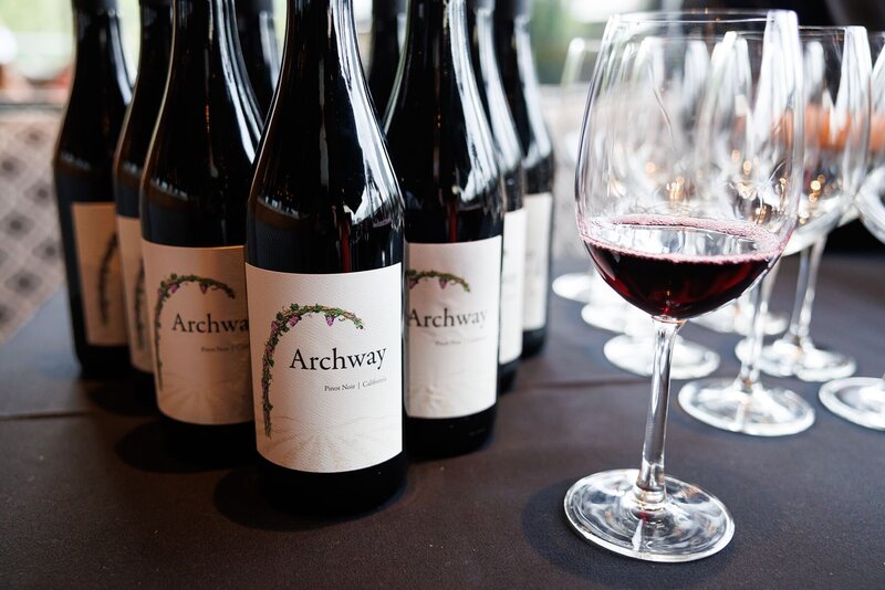 California red wine bottles and glasses at event