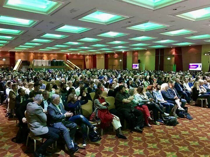 Photo of an audience at a conference