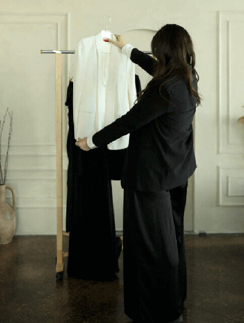 going through wardrobe on a photoshoot set