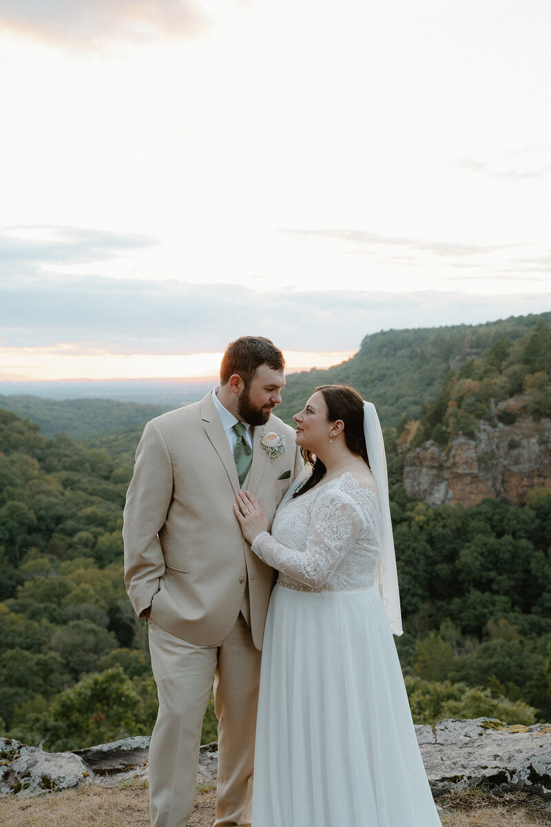 photo of a wedding couple on a mountain overlook