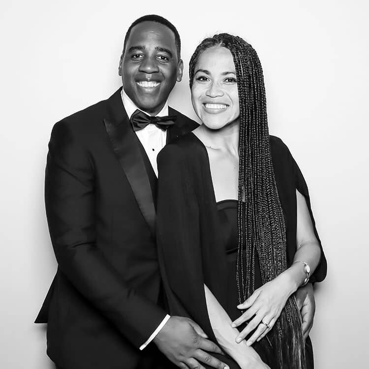 black and white portrait of a couple in black tie attire during a Mobile Portrait Studio Photo Booth