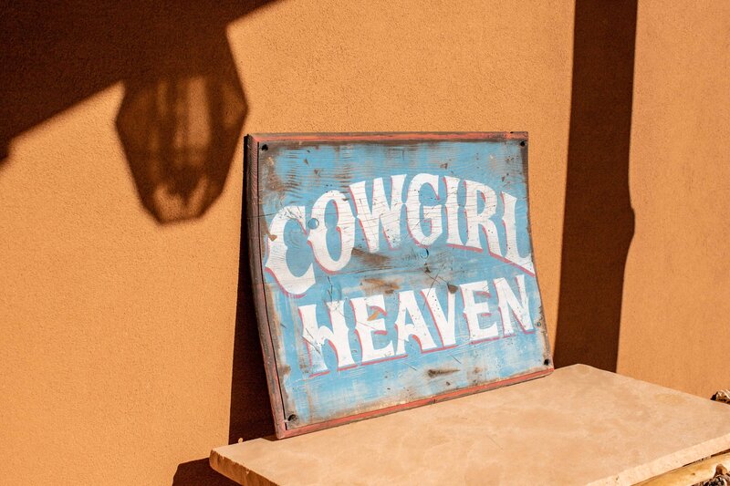 sign that says cowgirl heaven