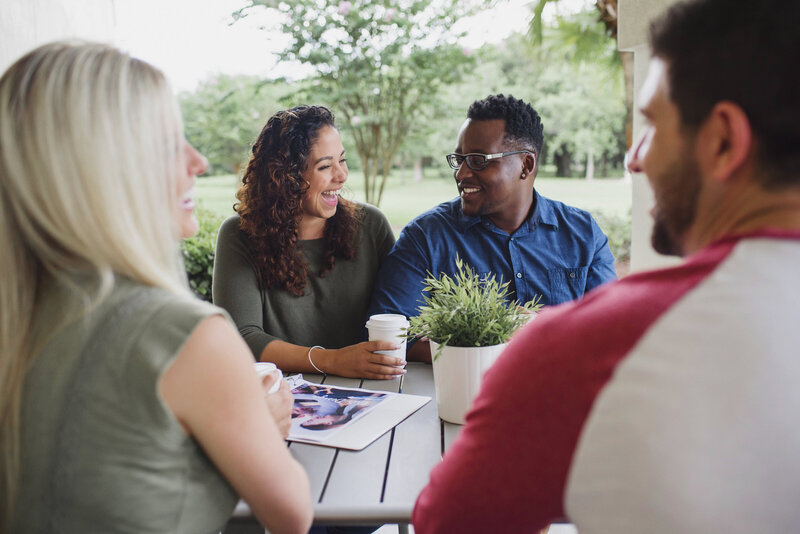 bride posing in wedding chapel aisle