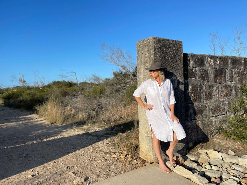 rebecca wearing white dress in nature