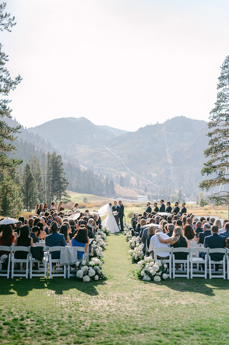 Bride and Groom stroll along Lake Como during their wedding day.