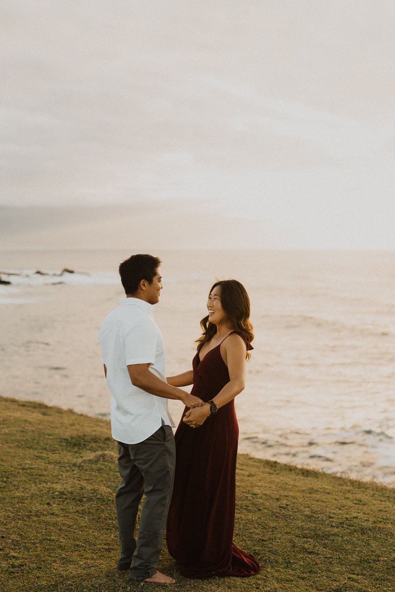 man & woman holding hands