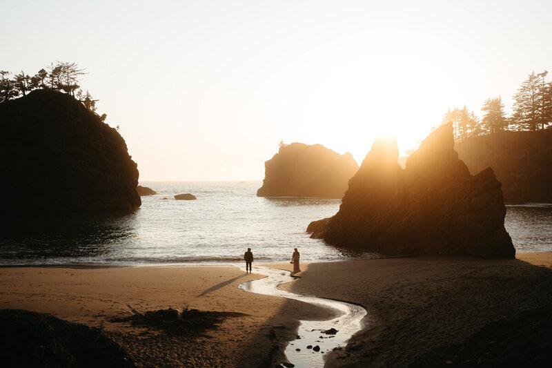 Elopement Photo Ideas | Eloping groom spins his bride and as her dress tosses in the wind