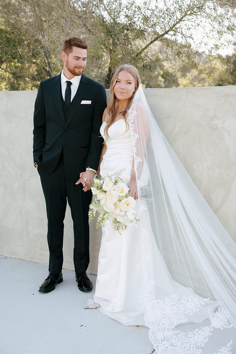 Bride and groom walk up memorial steps at their DC wedding