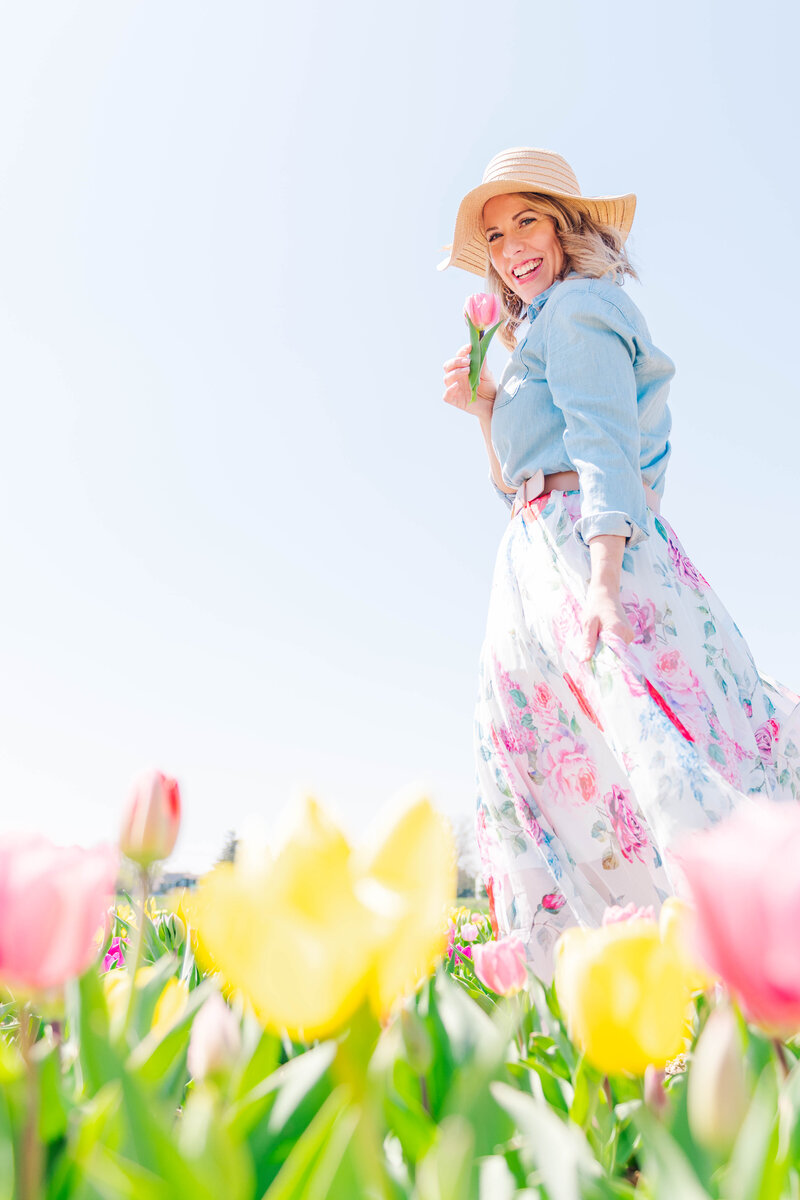 beautiful woman holding camera