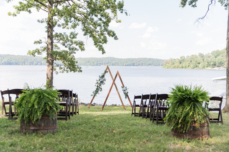 Intimate wedding ceremony location and arch by Kentucky lake