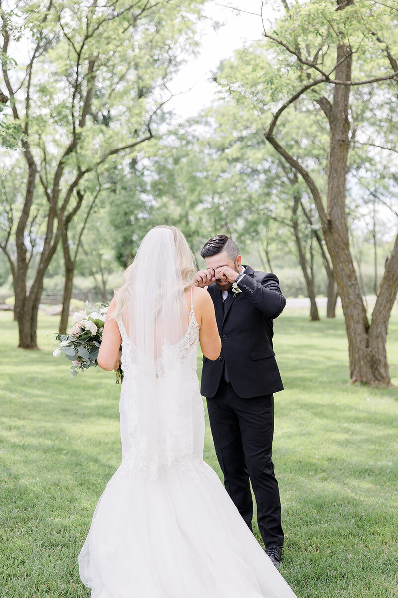 First Look reaction at Stonefields estate wedding in Ottawa Ontario. Photographed by Ottawa wedding photographer, Brittany Navin Photography