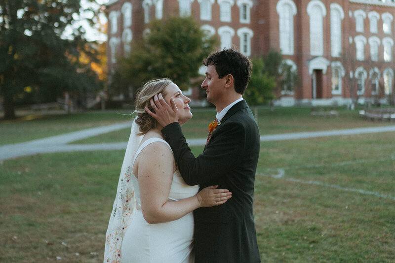 bride and groom looking at each other, captured by Elsie Goodman, an NYC wedding, engagement and couples photographer